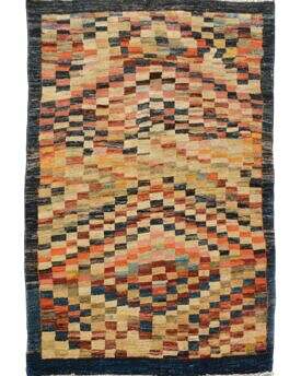 This is a beatufil nomadic afghan pattern hand made rug. It measures about 6 by 4 and is available for sale online or at our rug show room.