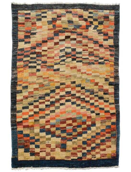 This is a beatufil nomadic afghan pattern hand made rug. It measures about 6 by 4 and is available for sale online or at our rug show room.