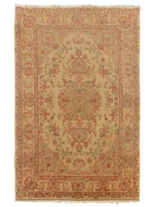 This is a Tabriz Hand Made Area Rug from China. It measures about 4 by 6 and is available at our online rug store.